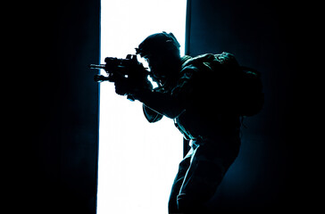 Paratroopers of french 1st Marine Infantry Parachute Regiment RPIMA studio shot firing pointing weapons