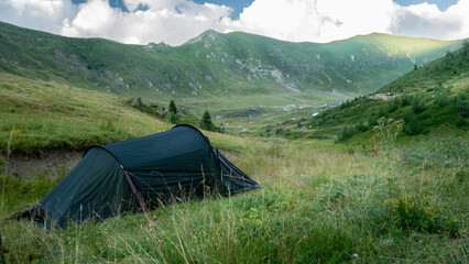 wild camping in the mountains. peaks of the Balkan. high mountains, blue skys
