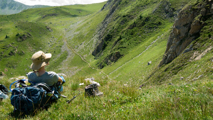 mountain view of the peaks of the Balkan. high mountains, blue skys. person in the middle

