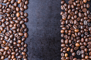 Coffee beans on dark background, close-up still life