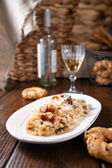 Risotto with porcini mushrooms.Typical Italian food white rice with mushrooms in parmesan sauce. Antipasto for dinner. Vertical. Copy spcae