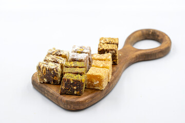 Mixed Turkish delight isolated on white background. Traditional Turkish delicacies. close up