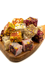 Mixed Turkish delight isolated on white background. Traditional Turkish delicacies. close up