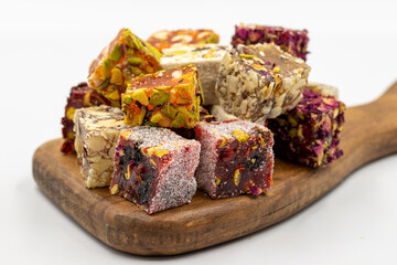 Mixed Turkish delight isolated on white background. Traditional Turkish delicacies. close up