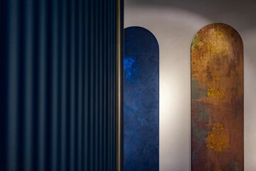 Selective focus shot of abstract arch paintings on a wall