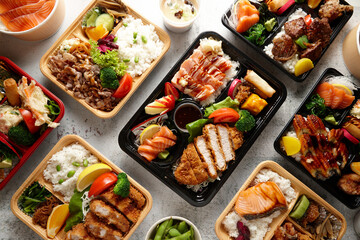 Bento Japanese food dishes on table