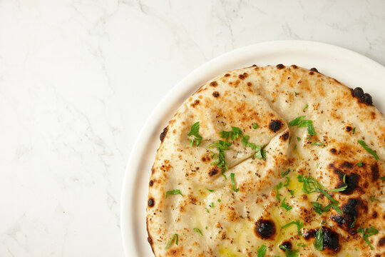 pita bread with olive oil and basil