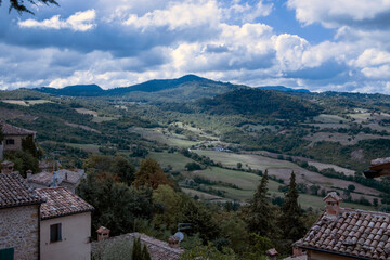 Obraz premium San Leo, (RN), Italy - August 10, 2022: The hills and landscape view from San Leo village, San Leo, Rimini, Emilia Romagna, Italy, Europe