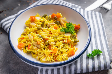 rice vegetable no meat vegetarian pilaf  healthy meal food snack on the table copy space food background 