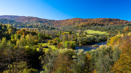 The San River Valley. The village of Tworylne, Bieszczady Mountains, Poland. Colorful autumn mountain landscape.
