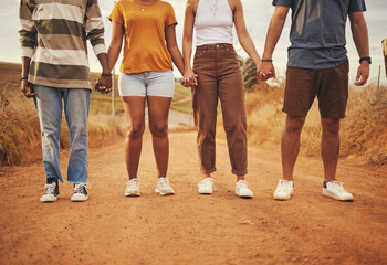 Support, teamwork and friends holding hands in summer for road trip vacation for community,...