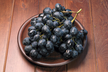 A bunch of sweet table black grapes