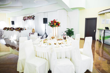 Fototapeta na wymiar Interior of a restaurant prepared for wedding ceremony