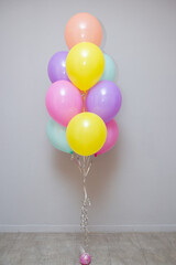 set of bright balloons for birthday, holiday decor with helium balloons