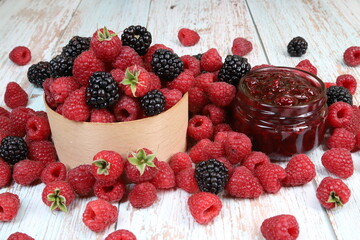 raspberries on wooden background