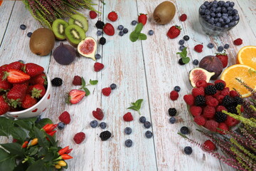 Fresh fruits on wooden background