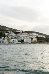 Fototapeta premium white and modern turkish houses near seaside on princess islands in turkey.