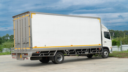 Trucks, containers, cargo in bulk. Freight concept.