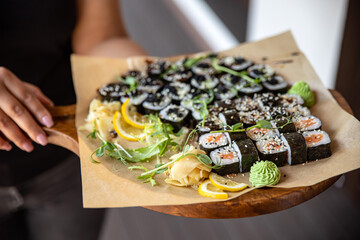 sushi roll with wasabi  on the plate. delicious food, close-up
