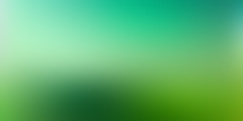 A blurry abstract gradient backdrop with many tones of green