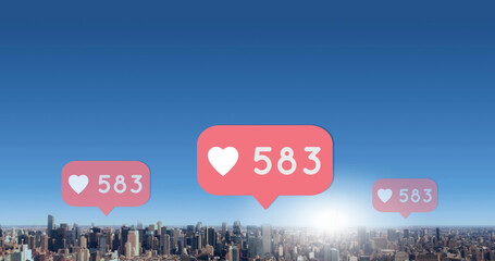 Image of social media reactions over cityscape