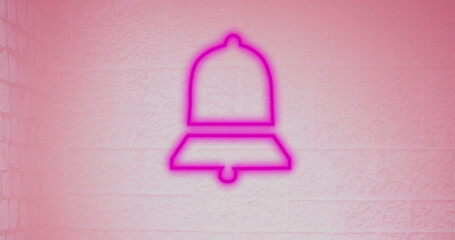 Composite of illuminated digital notification bell icon against pink wall, copy space