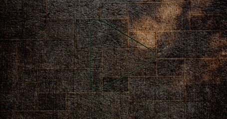 Composite of digital play button icon against grunge old wall, copy space