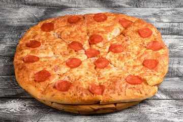 Pizza, homemade large size pizza on a wooden white background