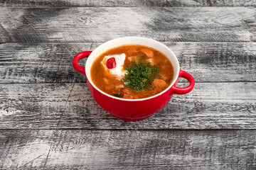 Soup, homemade soup on a wooden white background
