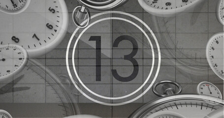 Image of number thirteen in vintage black and white film projector countdown with clocks and watches