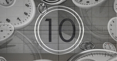 Image of number ten in vintage black and white film projector countdown with clocks and watches