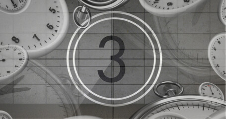 Image of number three in vintage black and white film projector countdown with clocks and watches