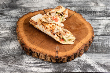 Shawarma, shawarma with chicken on a wooden white background