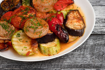 Vegetables, baked vegetables on a wooden white background