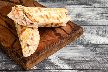 Shawarma, shawarma with chicken on a wooden white background