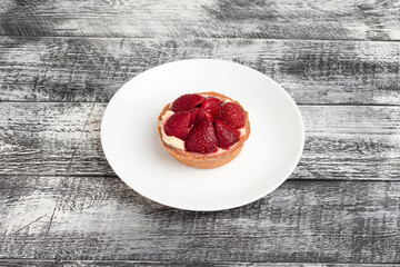 Dessert, berry dessert on a wooden white background