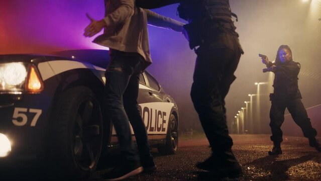 Police Officer Arrests Non-Violent Person, Decides to Restrain, Handcuff as Suspect. Angry Cop Uses Excessive Force against Civilian. Shocking Case of Police Brutality. Dramatic Cinematic Slow Motion