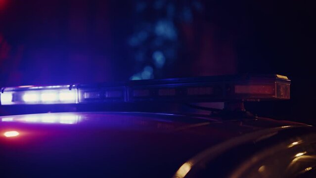 Close-up Static Shot of Police Car Siren Lights. Offices of the Law Ready for Action, Chase the Criminals, Arrest Offenders and Fight Crime. Stylish Cinematic Lights with Sunset Sky