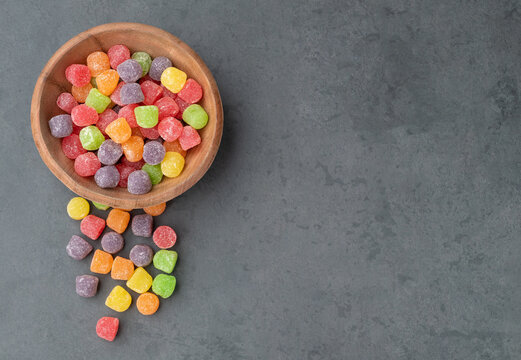 Colorful Gum Drop Candies Over Stone Background With Copy Space