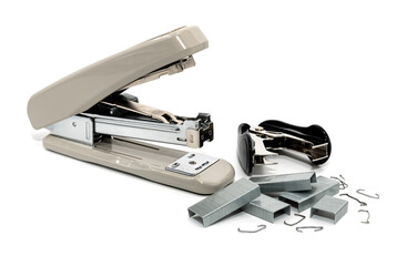 Stapler and anti-stapler with staples on a white background. Office supplies isolate