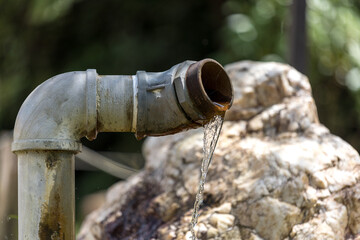 Water pipes with water coming out all the time.