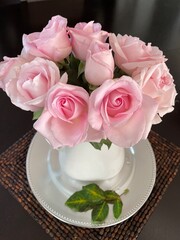 soft pink roses in vase