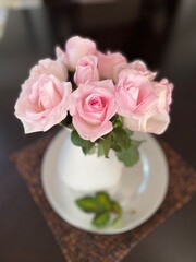 soft pink roses in vase