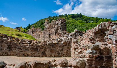 Fototapeta na wymiar Historic Castles of Scotland - mystical and mighty - witnesses of a great past Urquhart Castle is a ruined castle on Loch Ness. United Kingdom