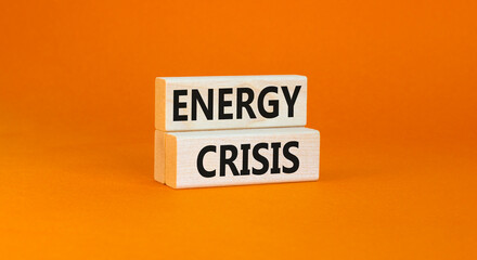 Global energy crisis symbol. Concept words Energy crisis on wooden blocks. Beautiful orange table orange background. Business global energy crisis concept. Copy space.