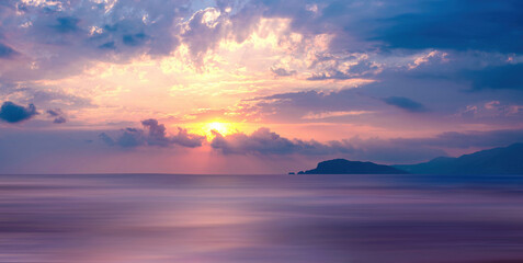 Naklejka na ściany i meble Very beautiful natural atmospheric seascape with purple sunset.