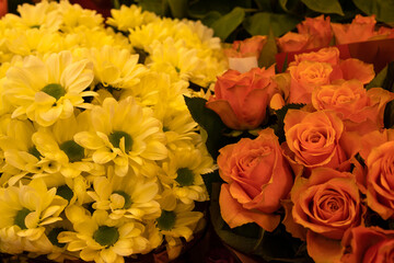 Bouquets of flowers yellow gerbera and coral roses, top view