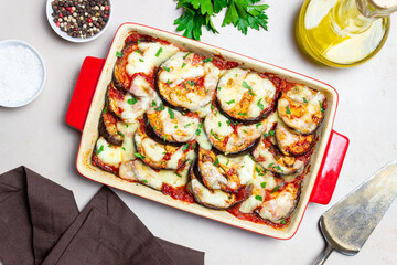 Baked eggplant with cheese mozzarella and tomatoes. Healthy eating. Italian food. Parmigiana di melanzane.