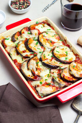 Baked eggplant with cheese mozzarella and tomatoes. Healthy eating. Italian food. Parmigiana di melanzane.
