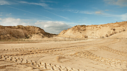 sand quarry, in the photo, a quarry for the extraction of sand against a blue sky